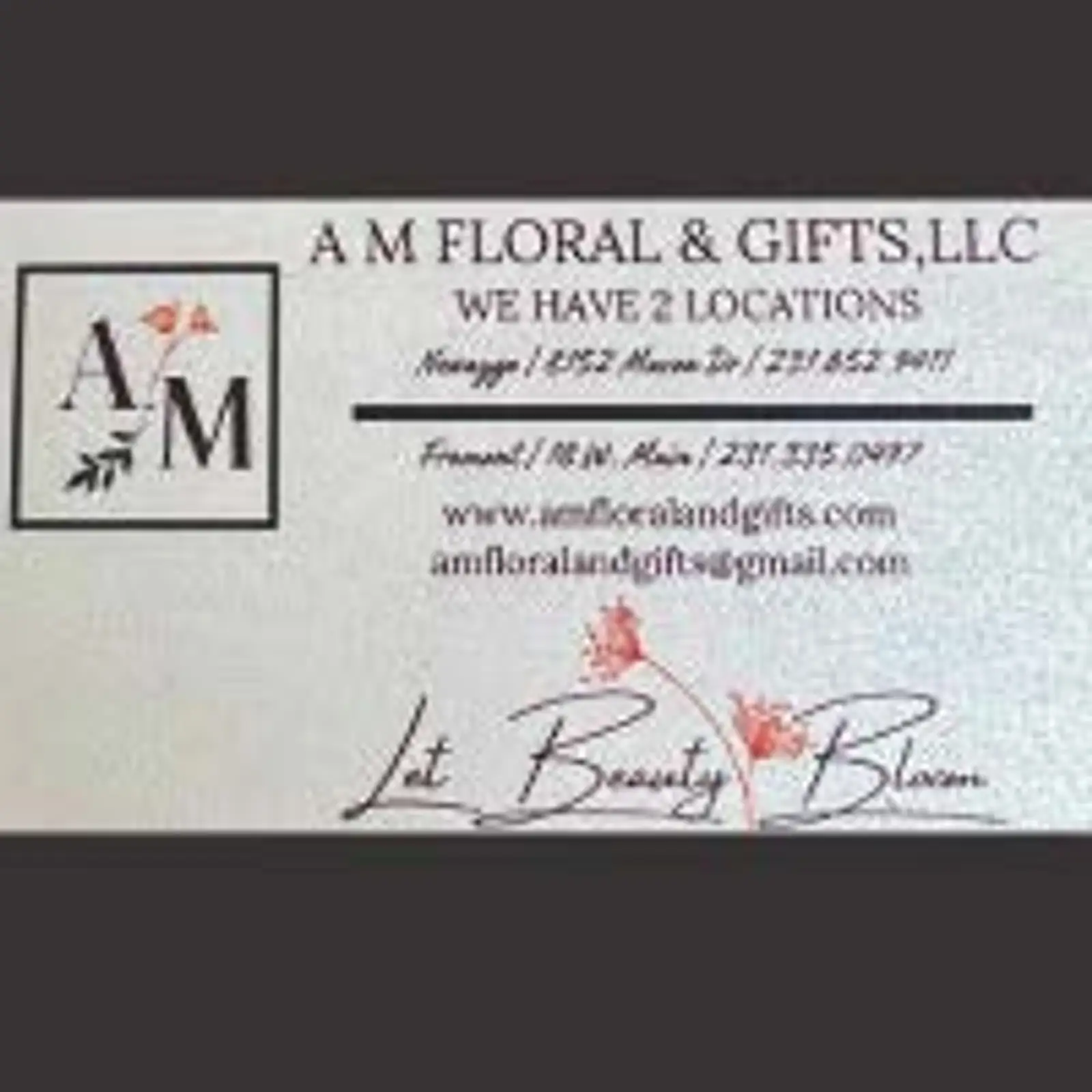 A M Floral & Gifts logo